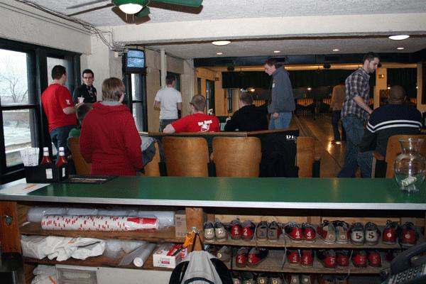 a group of people in a bowling alley