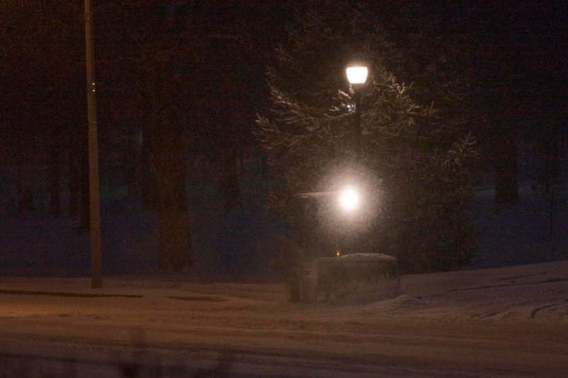 a street light in the snow