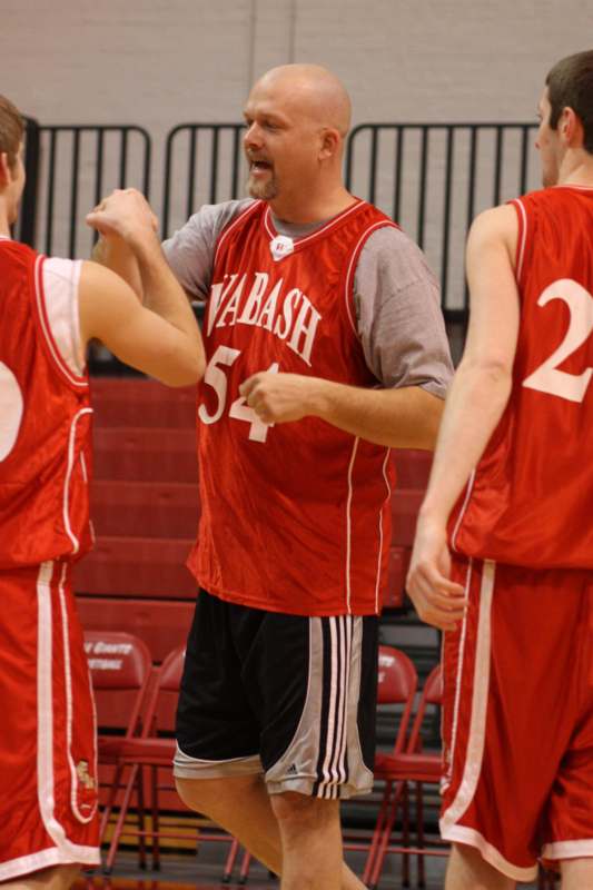 a basketball player giving a high five