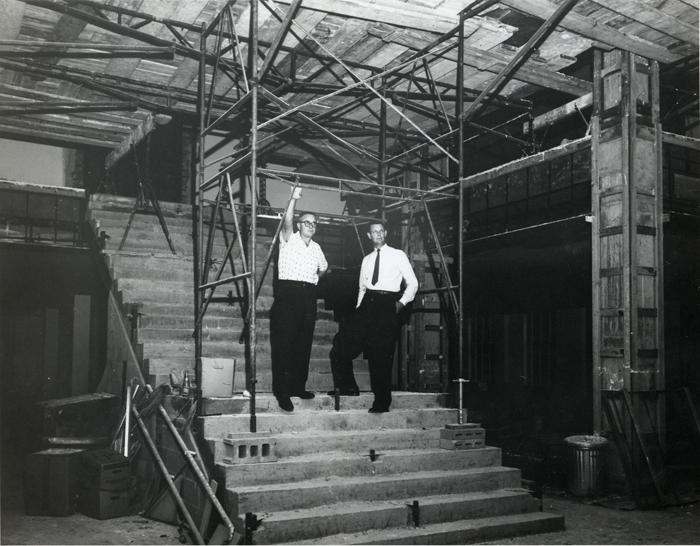 men standing on stairs in a building