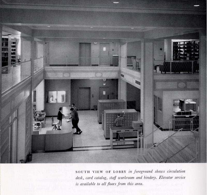 a black and white photo of a library