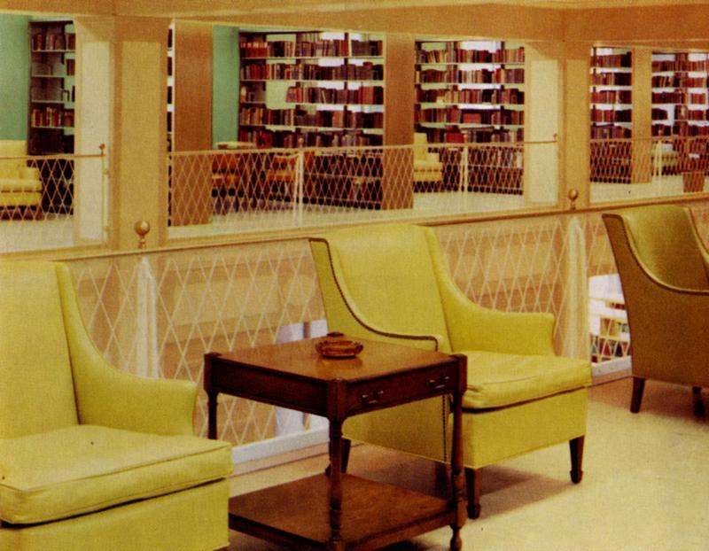 a room with chairs and a table