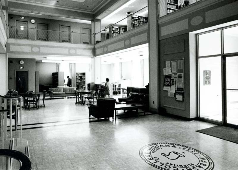a black and white photo of a library