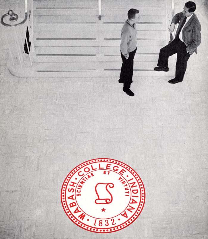 a group of men standing on the floor
