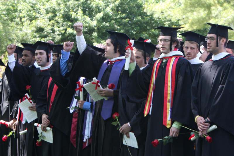 a group of people in graduation gowns
