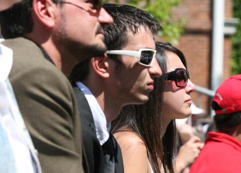 a group of people in sunglasses
