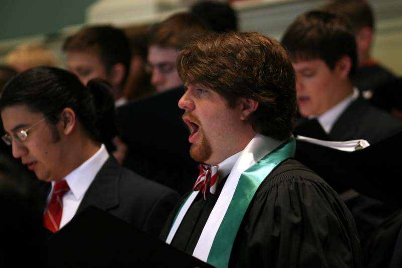 a man singing in a choir