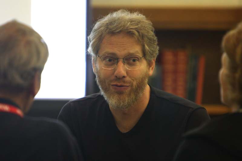a man with glasses and beard