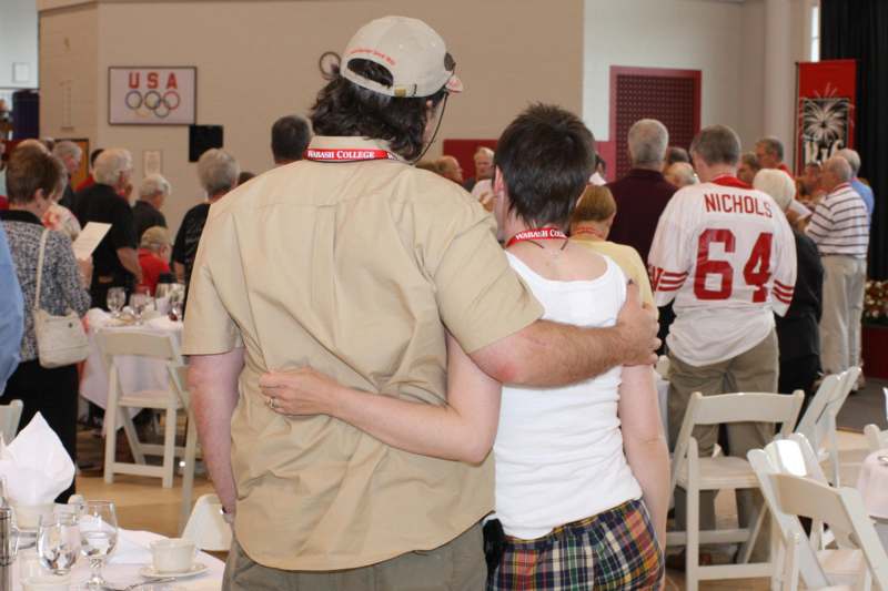 a man hugging a woman