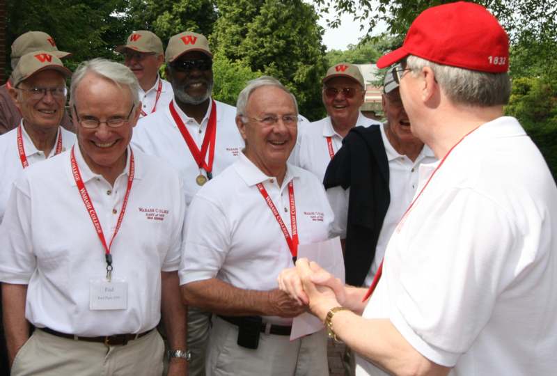 a group of men shaking hands