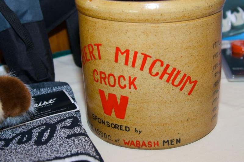 a crock with red writing on it