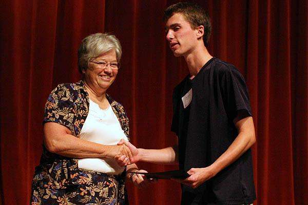 a man and woman shaking hands