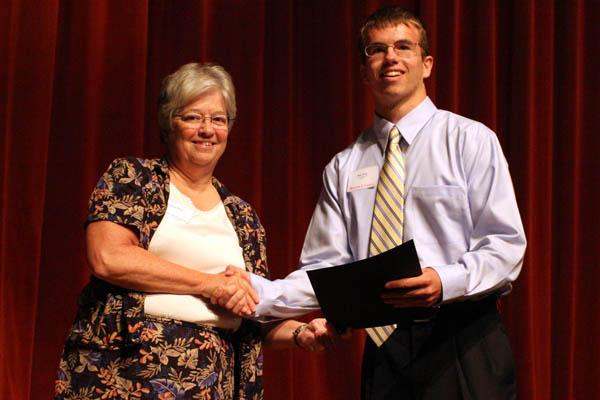 a man and woman shaking hands