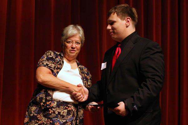 a man and woman shaking hands