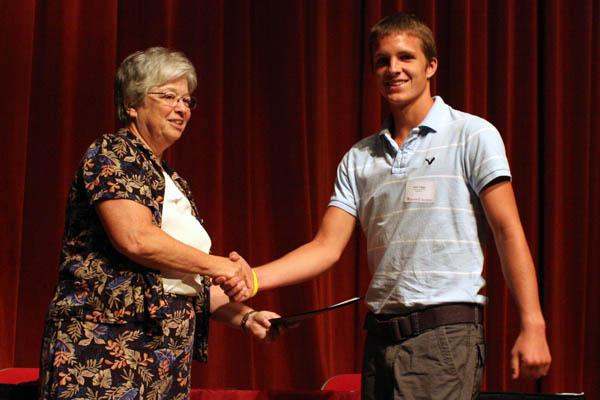 a man and woman shaking hands