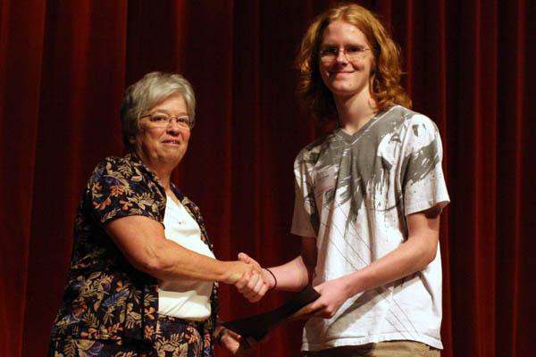 a man and woman shaking hands