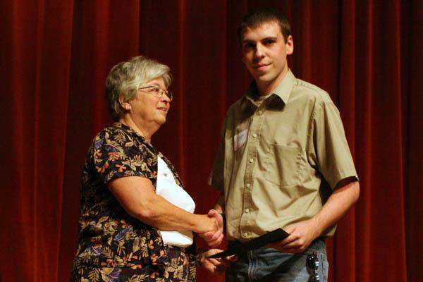 a man and woman shaking hands