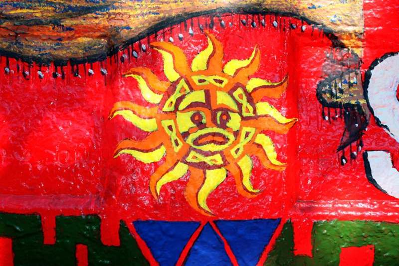 a painting of a sun