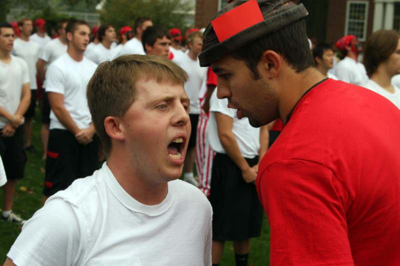 a man yelling at another man