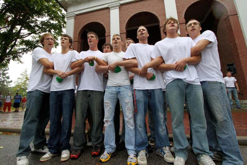 a group of young men standing together