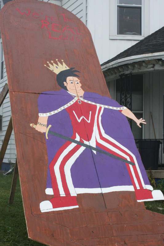 a large piece of wood with a cartoon character on it