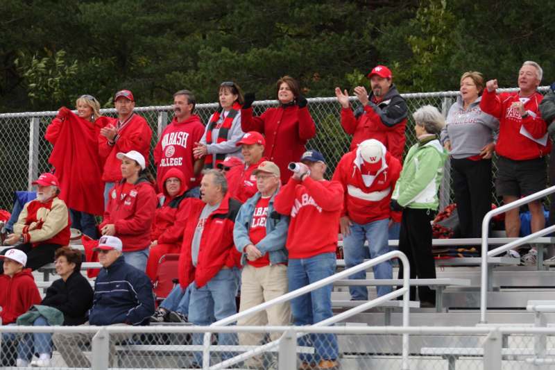 a group of people in red jackets