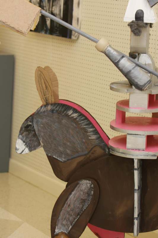 a cardboard squirrel with a sword and a sword