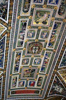 a ceiling with many paintings