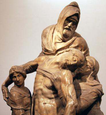 a statue of a man carrying a man