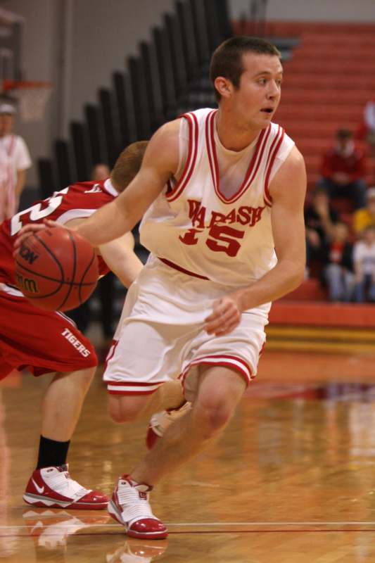 a basketball player dribbling the ball