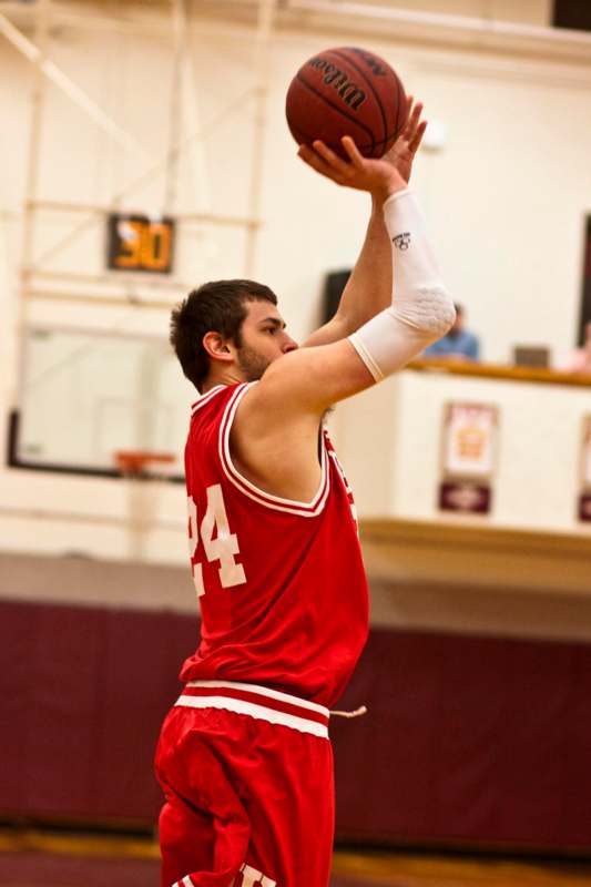 a man in a basketball uniform