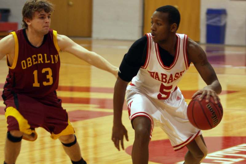a basketball player dribbling a basketball