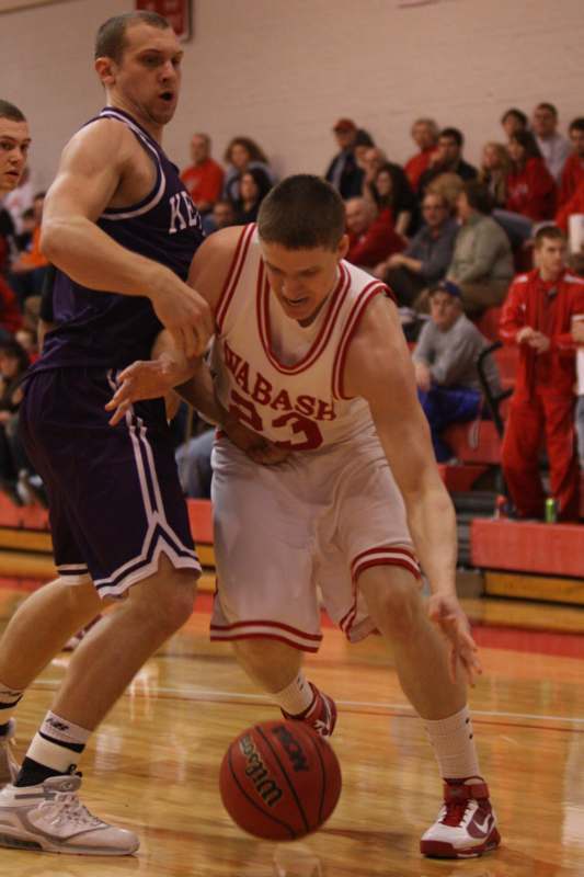 a basketball player in a red uniform
