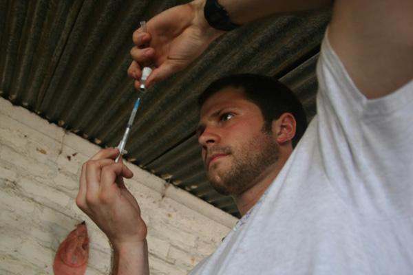 a man holding a screwdriver