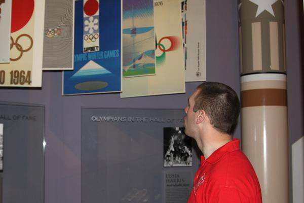 a man looking at a display