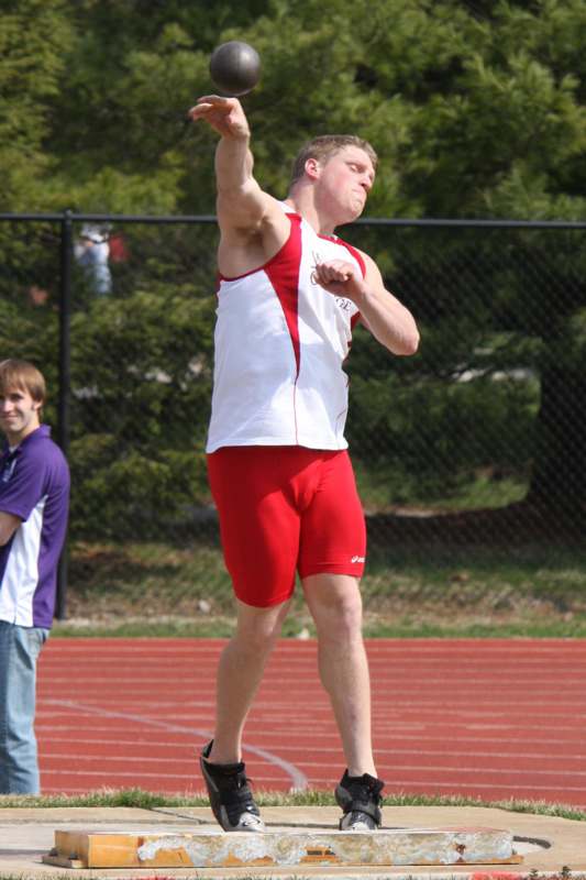 a man throwing a discus