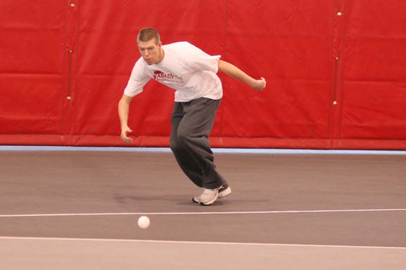 a man playing a game of tennis