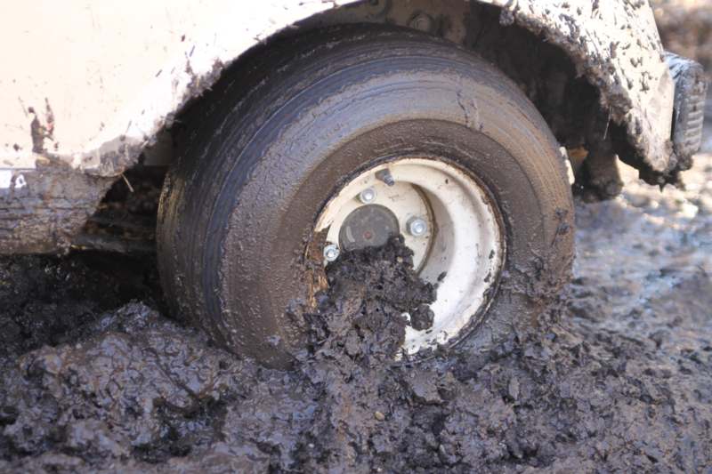 a tire in the mud