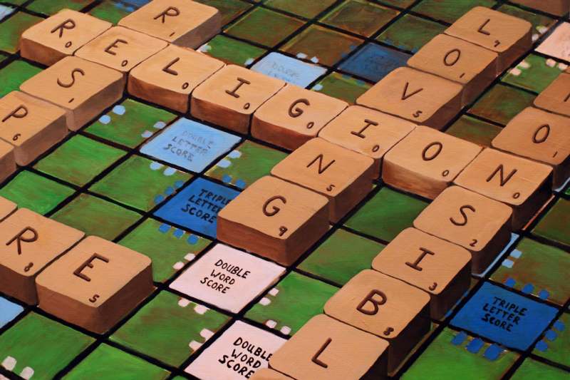 a game of scrabble with words on it