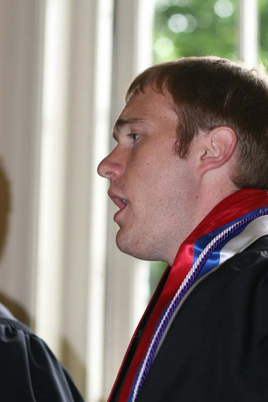 a man with a red and blue scarf