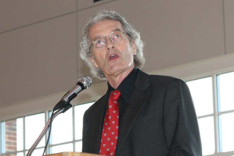 a man speaking into a microphone