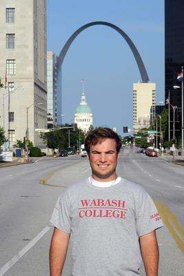 a man standing in the middle of a street