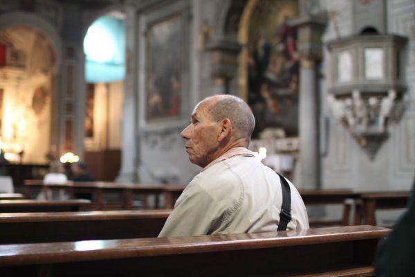 a man sitting in a church