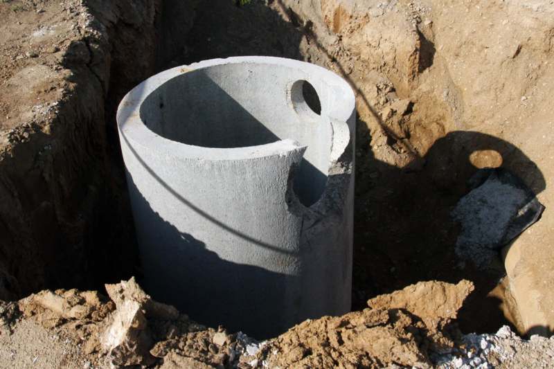 a concrete pipe in the ground