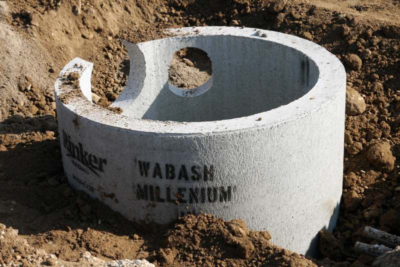 a concrete ring with holes in it