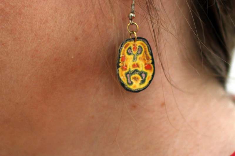 a close up of a earring