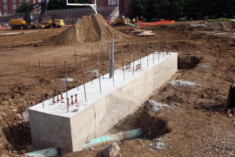 a concrete foundation being constructed