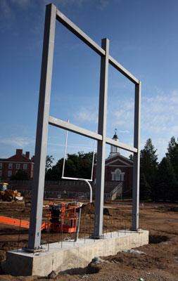 a large metal frame with a cross