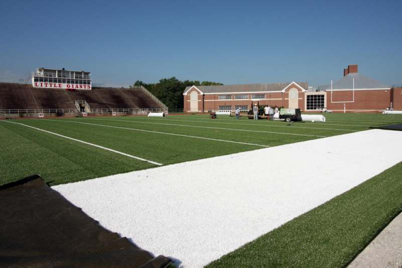 a football field with a white strip