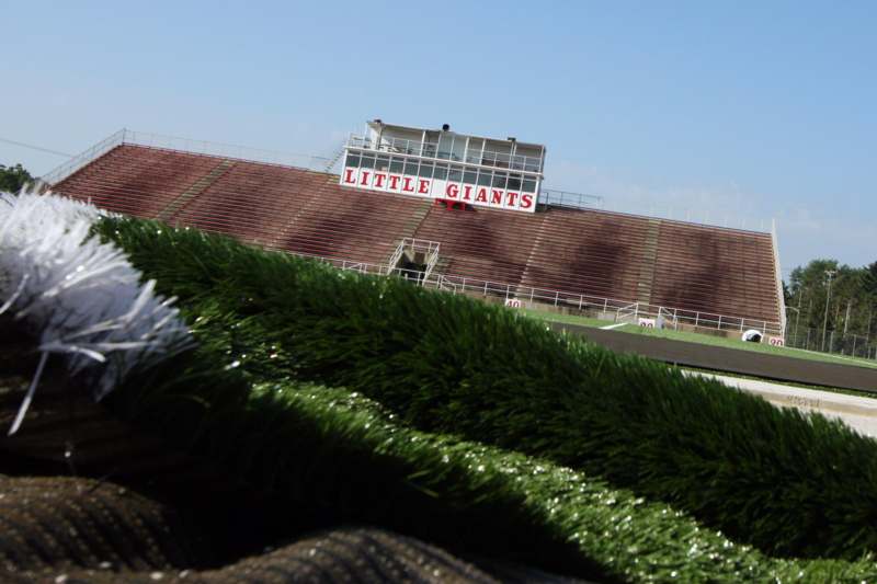 a stadium with a sign on the side
